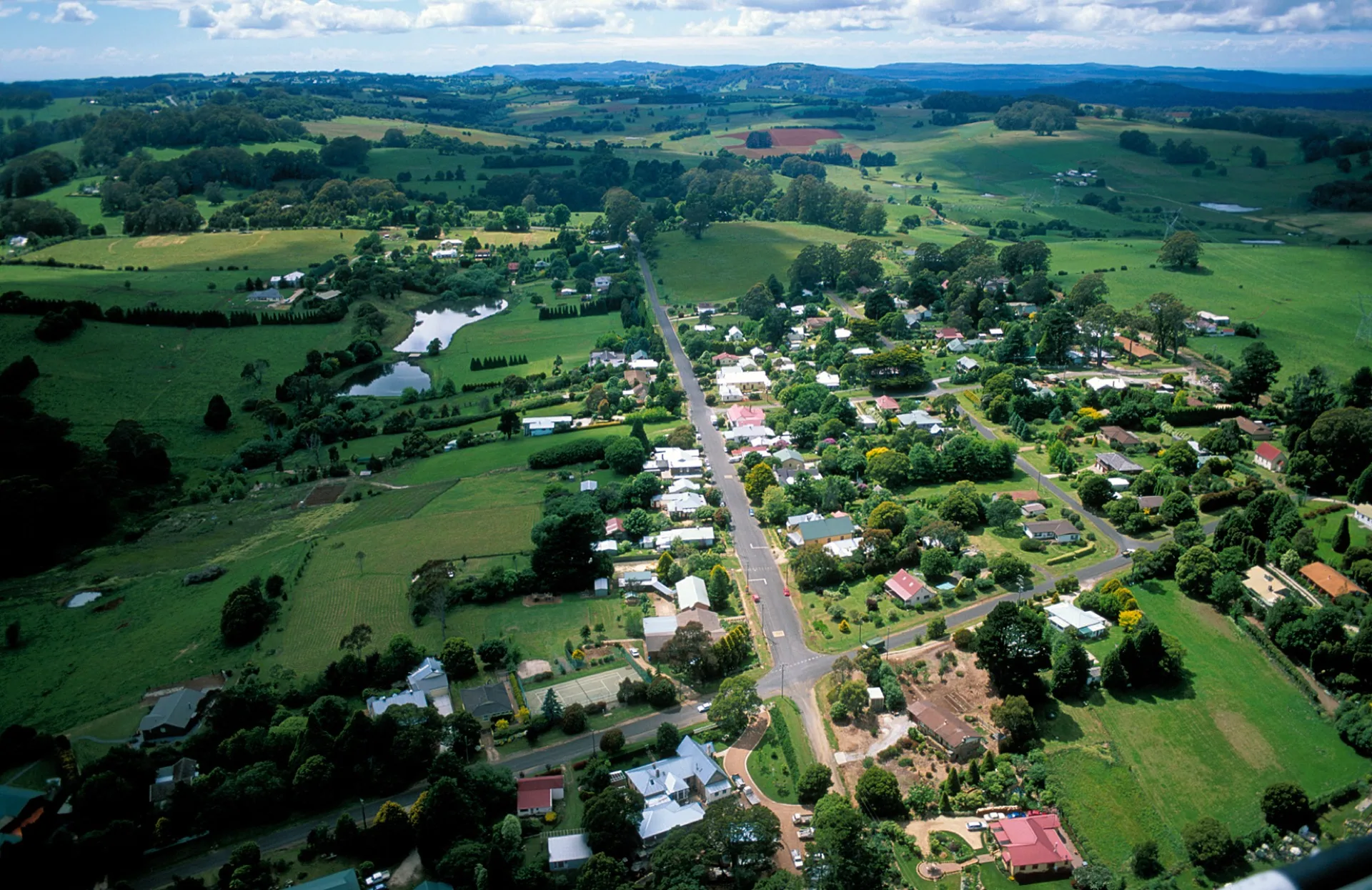 Aerial view of green pastoral farmland in the NSW Southern Highlands